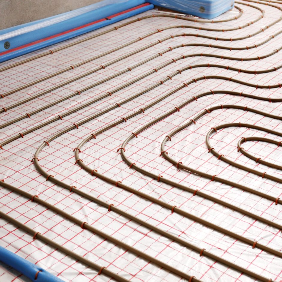 Installation of underfloor heating system in building